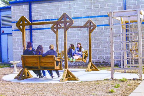 Students enjoying the new outdoor classroom at CCAMS.